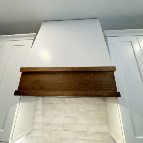 Angled custom wood range hood installation